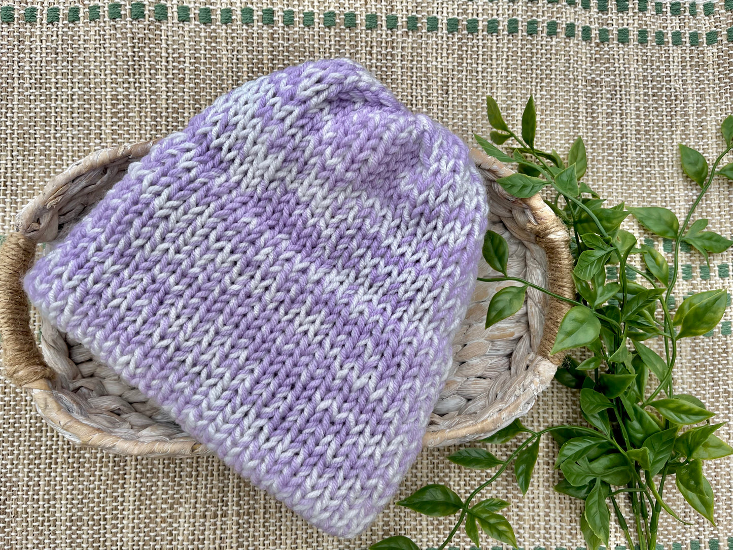 purple and white hat