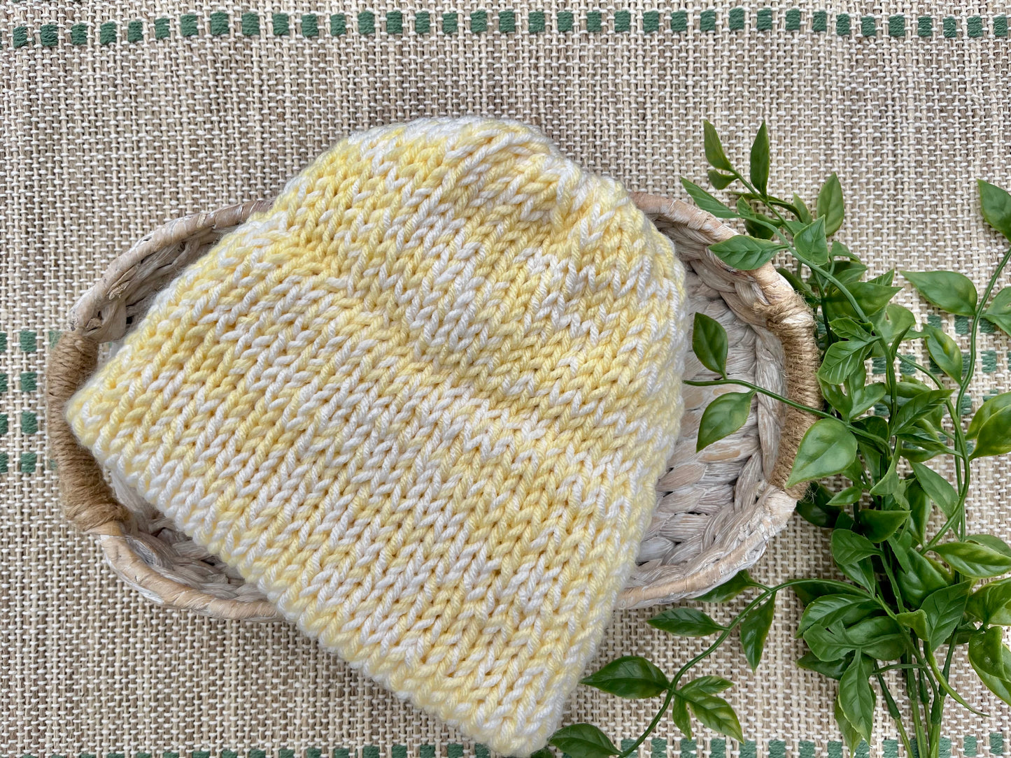 yellow and white knit beanie