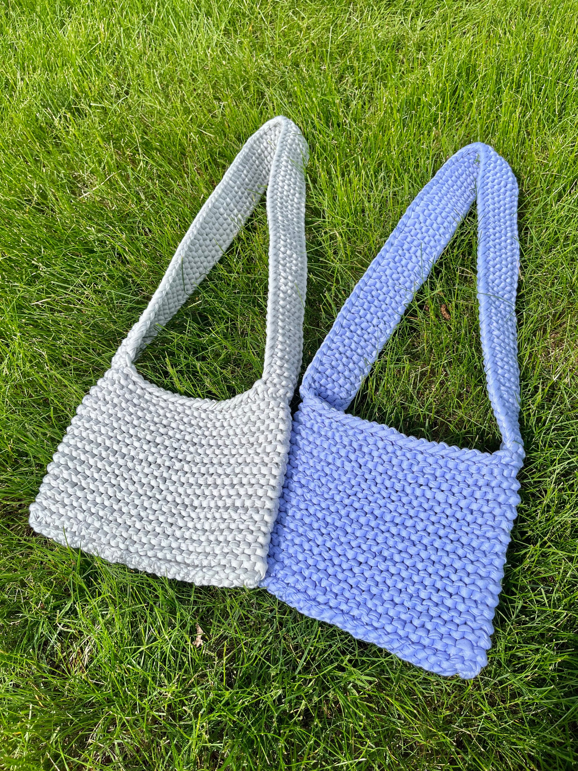 knit tote bags on grass